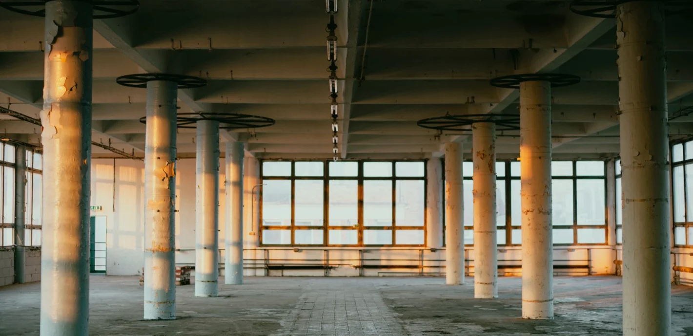 A Regional Newsroom Studio That Had to Fit Inside an Old Warehouse Bay